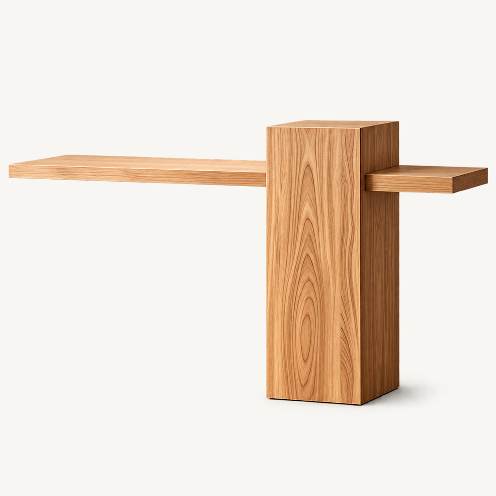 Light wood-tone console table with a narrow horizontal top passing through an offset rectangular pedestal.