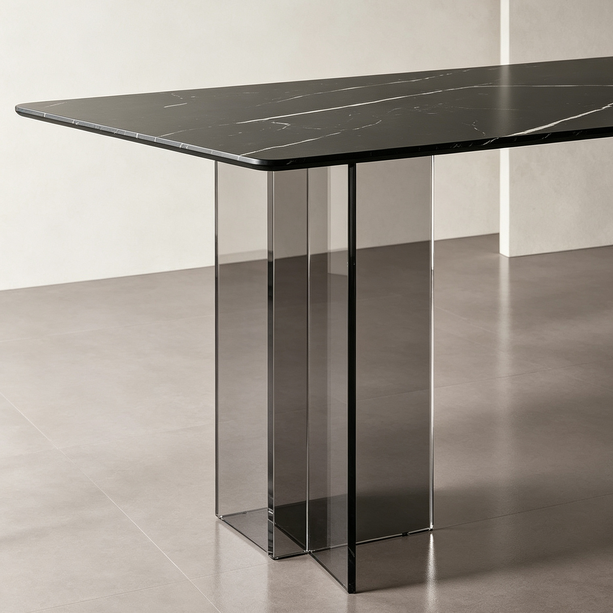 Detail of the dining table's smoky transparent intersecting panel support beneath the dark top.