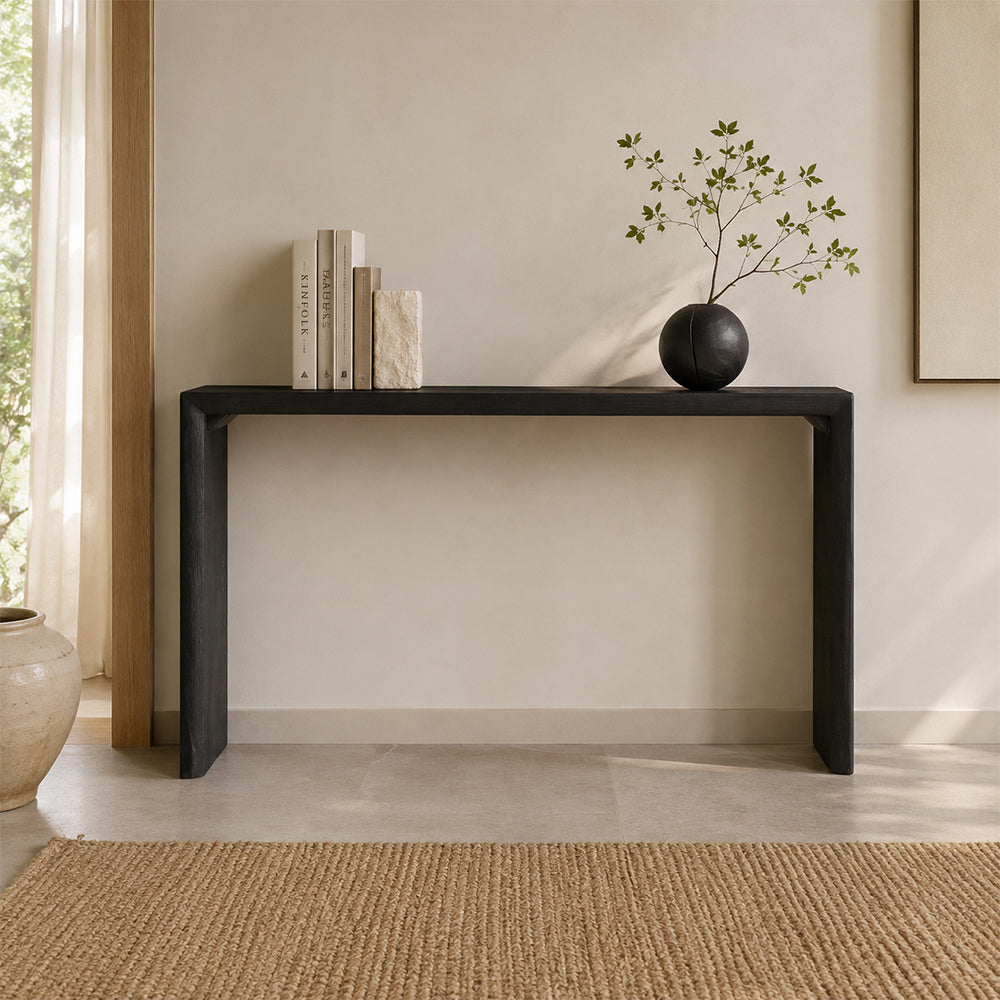 Front view of a black rectangular console table with a slim top and broad side panels.
