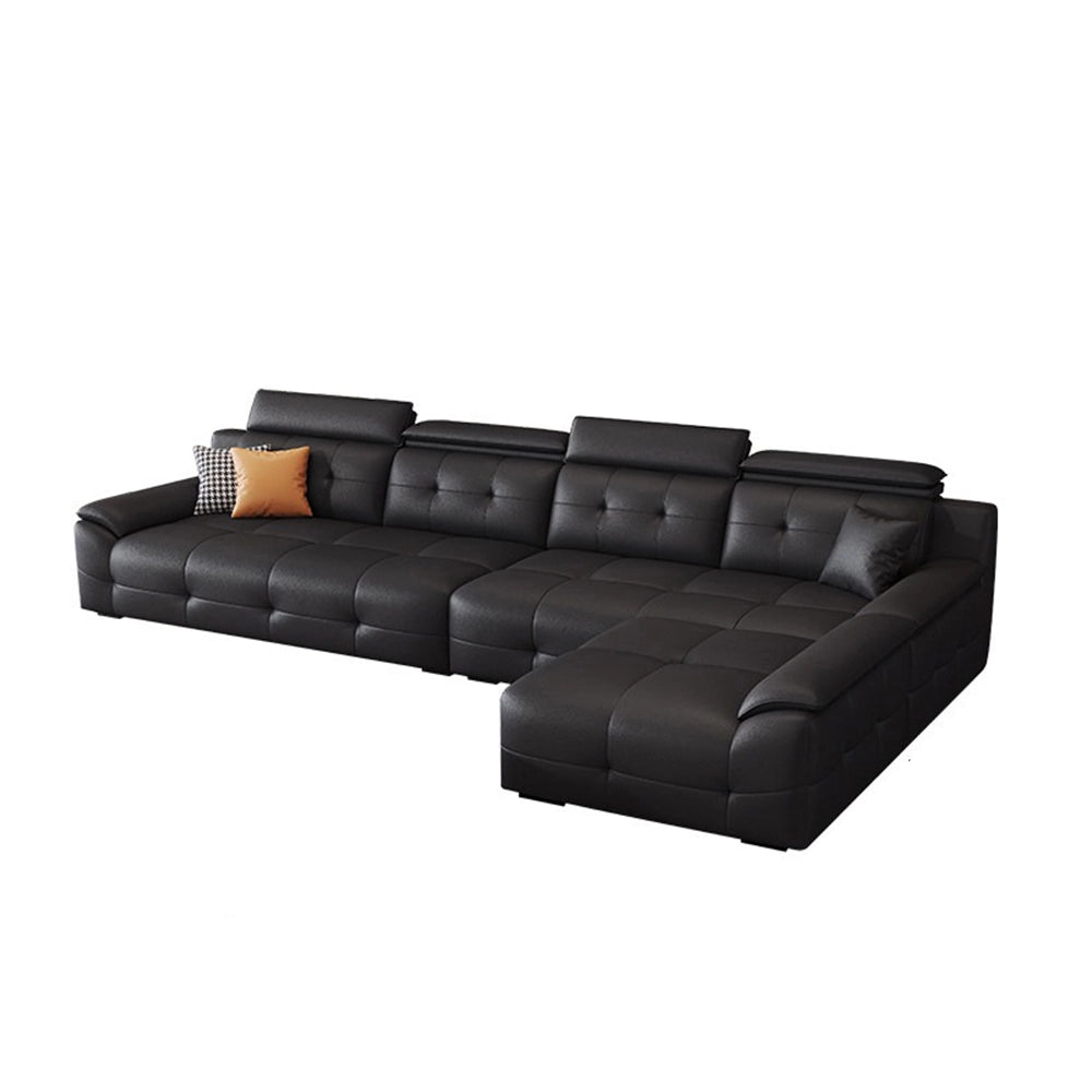 Black tufted sectional sofa with a right-side chaise, shown on a white background.