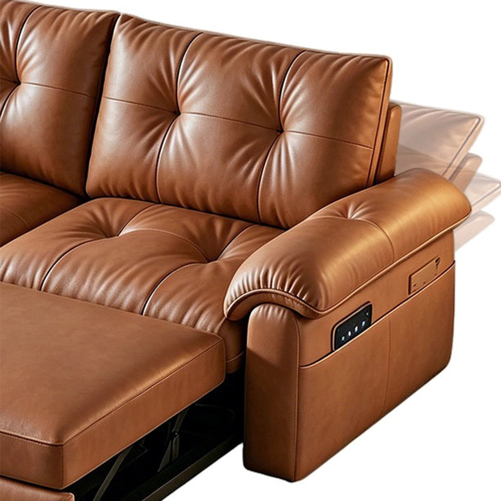 Detail of the brown sofa bed's rolled padded arm, side control panel and tufted back cushion.