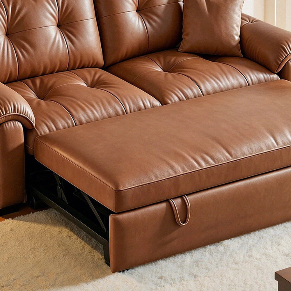 Close-up of the brown sofa bed's extended cushion, front pull loops and tufted seat.