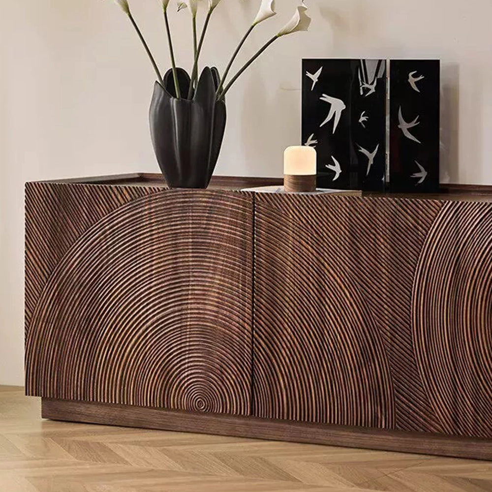Angled detail of the TV cabinet's closely spaced curved grooves and wood-tone door panels.