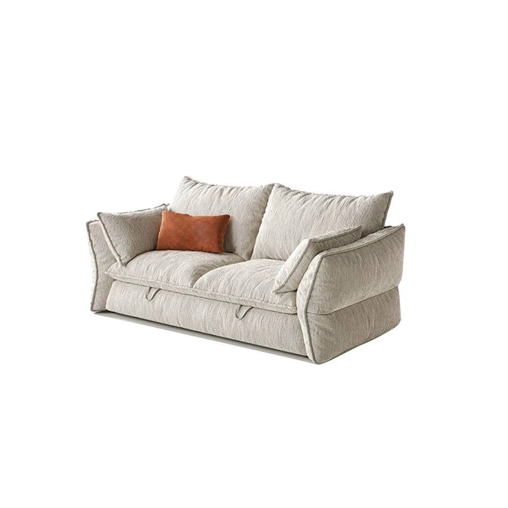 Cream sofa bed with a broad two-cushion seat and loose back pillows, shown in sofa form.