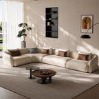 Cream modular sofa with a corner section on the left as pictured and loose back cushions.