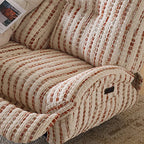 Overhead detail of the striped loveseat's curved arm, seat and outer control panel.