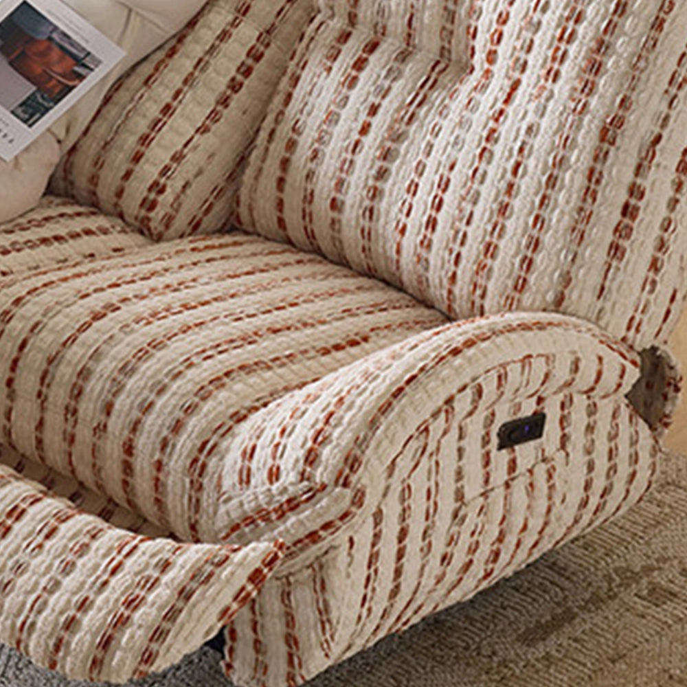 Overhead detail of the striped loveseat's curved arm, seat and outer control panel.