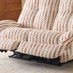 Close-up of the striped loveseat's extended footrests and dark support mechanism beneath the seats.