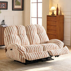 Cream and rust striped reclining loveseat with both footrests extended in a living room.
