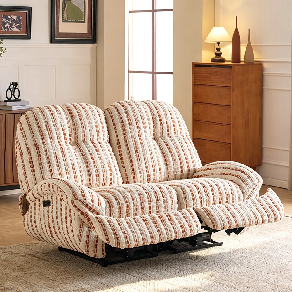 Cream and rust striped reclining loveseat with both footrests extended in a living room.