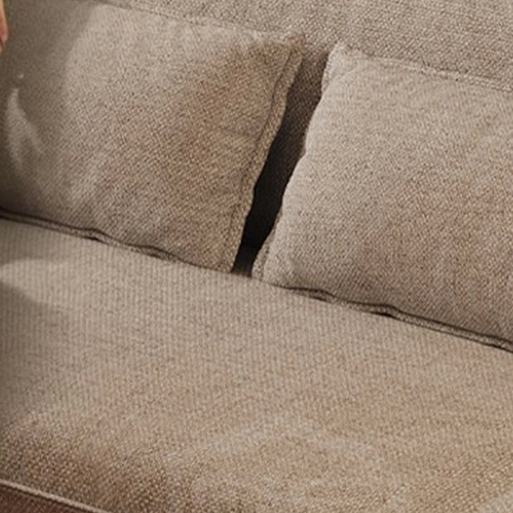 Close-up of the taupe sofa upholstery showing its woven surface texture.