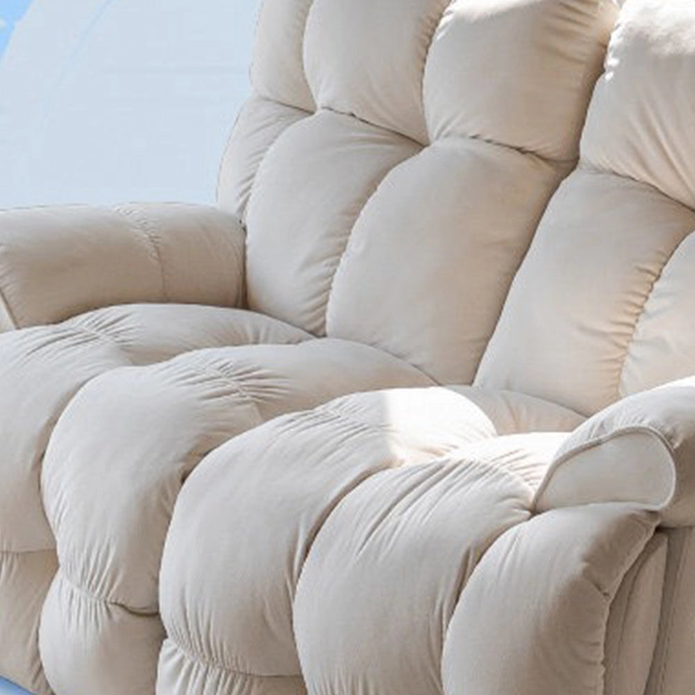 Close-up of the cream loveseat's padded back, seat and rounded arm upholstery.