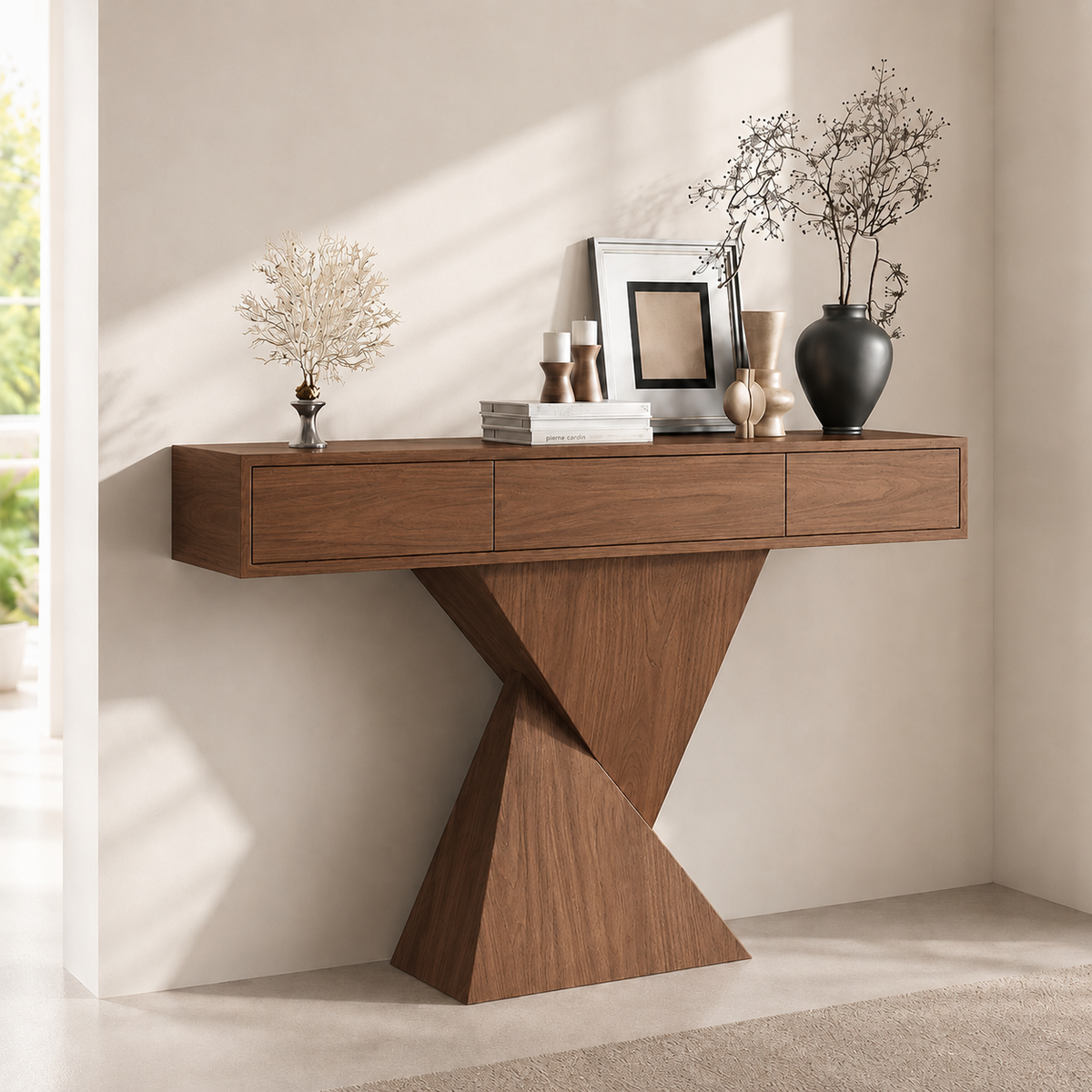 Warm brown version of the three-drawer geometric-base console table, styled with vases and picture frames.