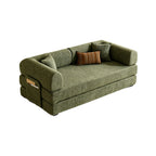 Green fold-out sofa bed with stacked cushions and rounded arms on a white background.