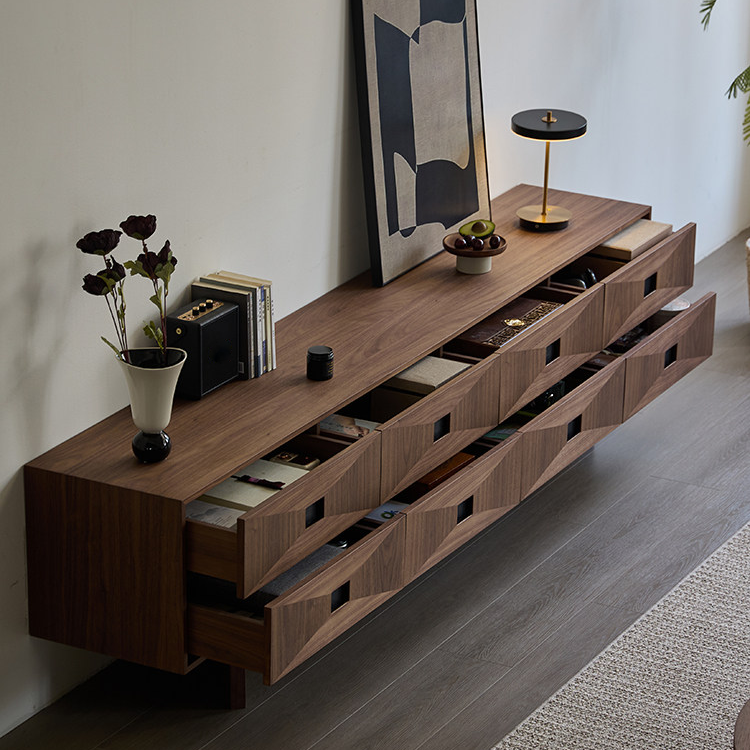 Brown TV stand with multiple drawers pulled open to reveal divided storage compartments.