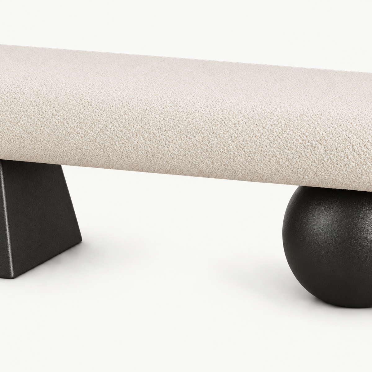 Front detail of the cream textured bench seat above its two black geometric supports.
