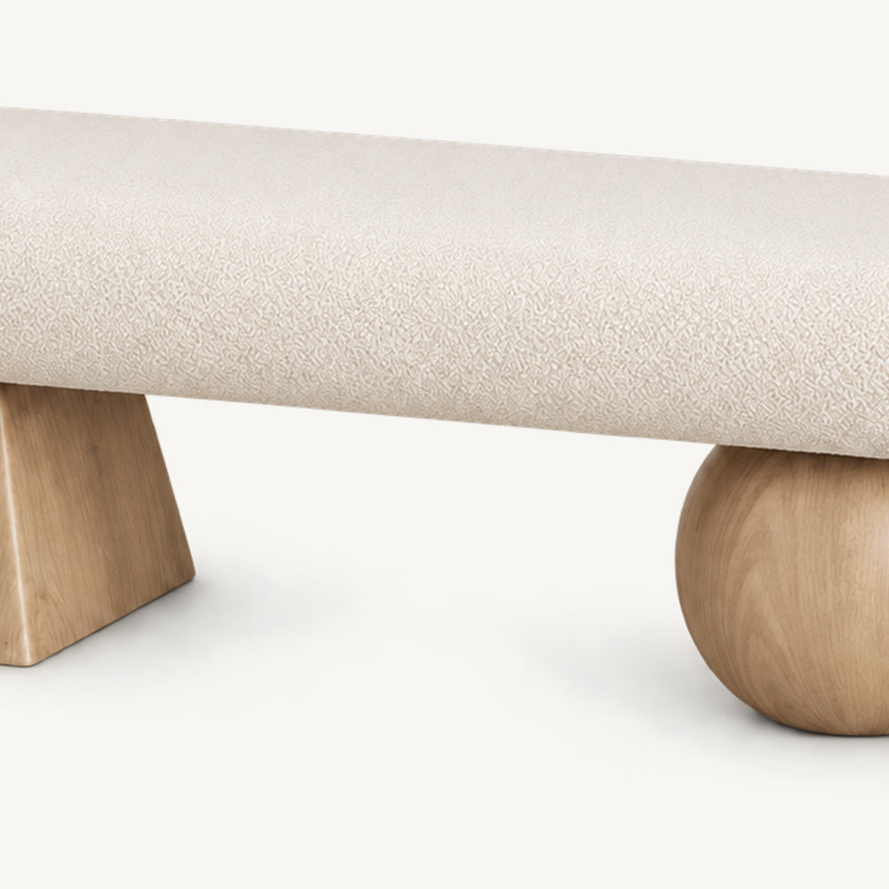 Front detail of the cream textured bench seat above its two light wood-tone geometric supports.