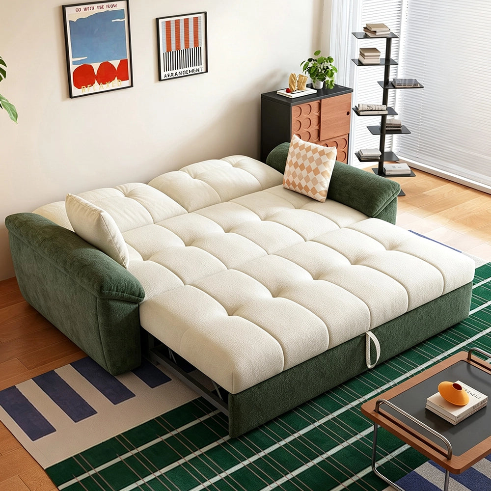 Green and cream sofa bed fully opened with its backrest lowered into a broad flat sleeping surface.