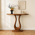 Front view of the brown console table with a curved tabletop and loop-shaped central pedestal.