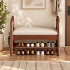 Front view of the brown shoe bench with cream upholstery, raised handles and open shoe storage.