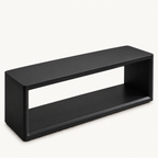 Black rectangular bench with thick rounded frame edges and an open lower shelf on a white background.