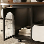 Close-up of the coffee table's open arched ribbed-glass cabinet door and storage compartment.