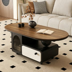 Brown-top coffee table with a dark storage base, cream drawer and ribbed-glass cabinet on a patterned rug.