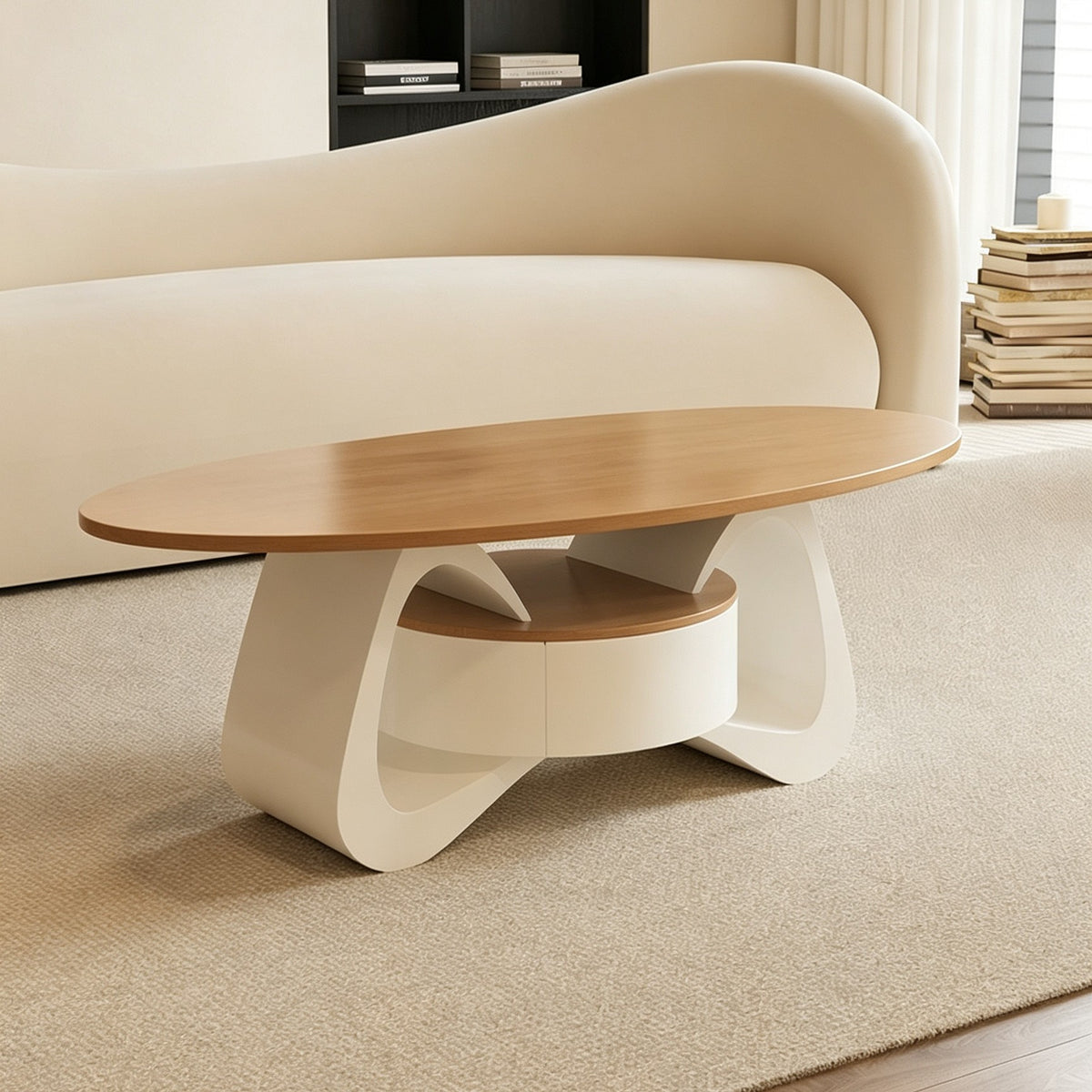 Oval light wood-tone coffee table with a cream curved base and central drawer unit.