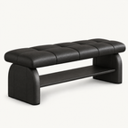 black upholstered bench with a rectangular stitched seat, rounded side supports and an open lower shelf.