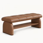 brown upholstered bench with a rectangular stitched seat, rounded side supports and an open lower shelf.
