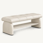 cream upholstered bench with a rectangular stitched seat, rounded side supports and an open lower shelf.