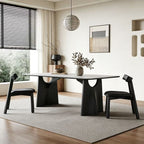 Side view of the pale-top dining table with two black supports and curved openings beneath the top.
