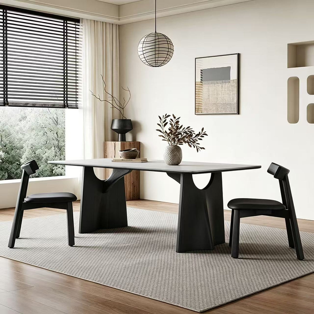 Side view of the pale-top dining table with two black supports and curved openings beneath the top.