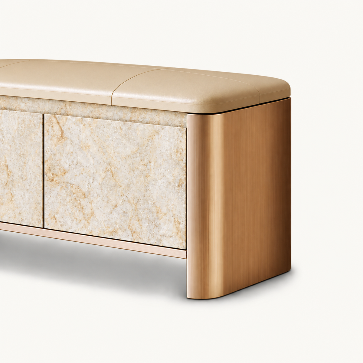 Close-up of the bench's rounded gold-tone side, beige cushion and pale beige patterned door.