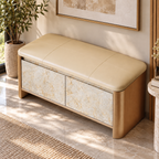 Angled overhead view of the beige padded bench seat above pale beige patterned cabinet doors.
