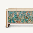 Front detail of the bench's two turquoise and brown patterned doors and recessed base opening.