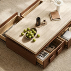 Overhead view of the coffee table with drawers open on both sides, showing divided storage.