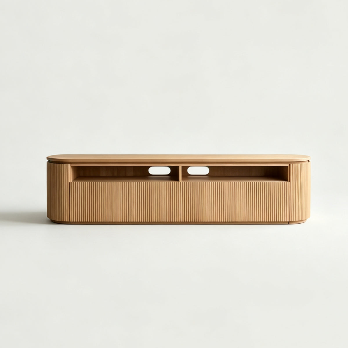 Front view of the wood-tone TV stand with rounded corners, ribbed storage fronts and two open media compartments.