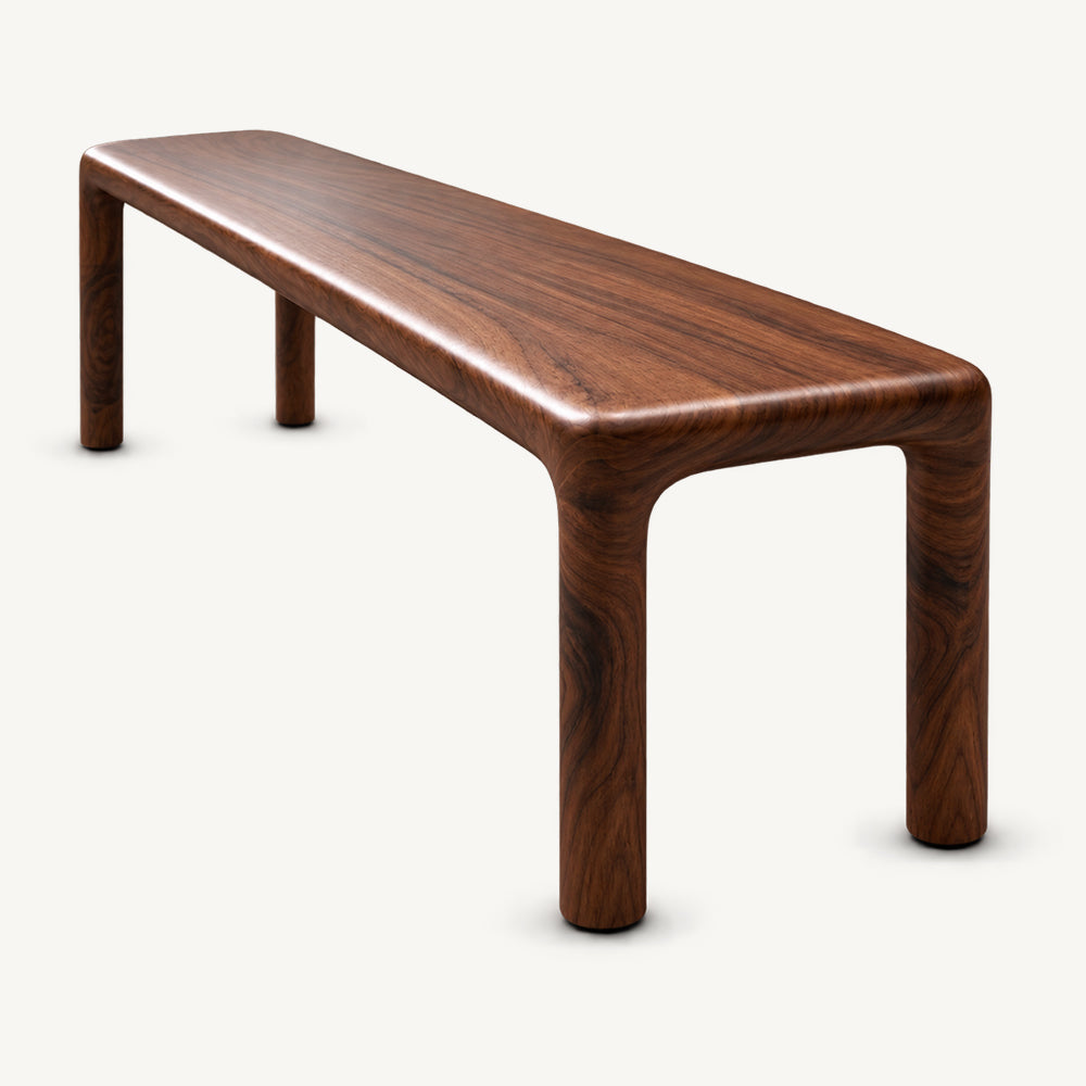 Angled end view of the brown bench showing its smooth seat and curved inner leg corners.