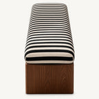 Straight end detail of the striped bench cushion and broad wood-grain leg.