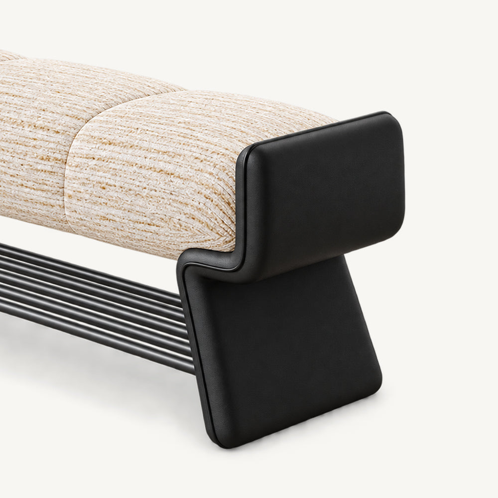 Angled close-up of the cream bench cushion and shaped black side support.