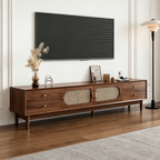 Extended brown TV cabinet with woven-pattern doors and round drawer knobs in a bright room.