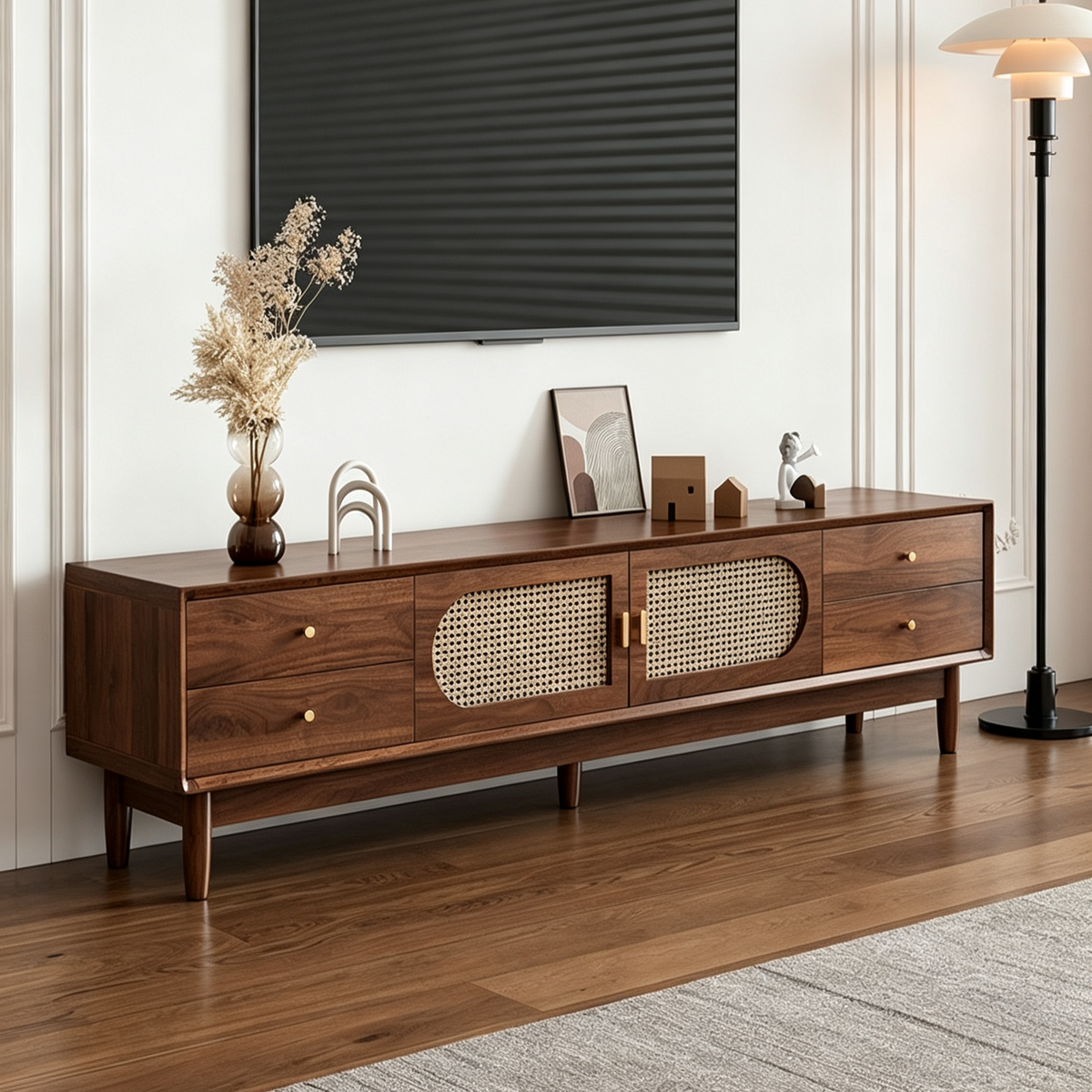 Wide brown TV cabinet with pale woven-pattern doors, multiple drawers and slender legs.